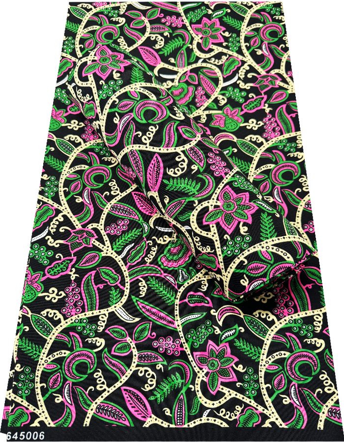 African Colorful patterned fabric with pink, green, and gold design on a black background