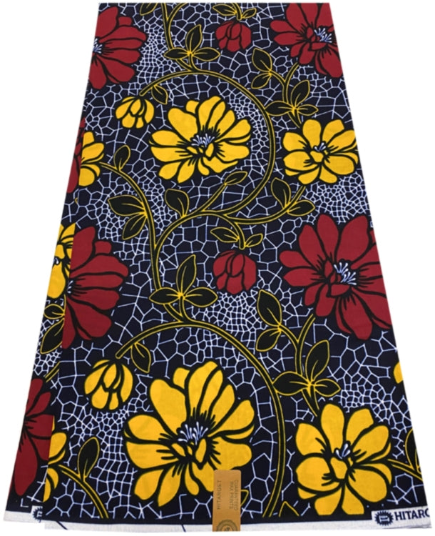 Yard of African floral wax print fabric featuring a geometric and floral pattern in red, yellow, white, and blue on a black background.