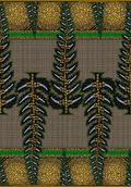 A piece of fabric with a geometric pattern featuring a combination of apple green, brown, red, white, dark blue, and black colors.