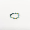 Green G-Link Chain streetwear bracelet with turquoise marble beads and gold spacers on a clean white background.
