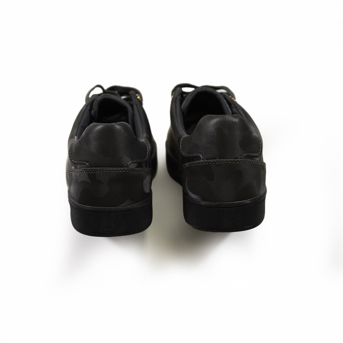 Rear view of black Camel Flush sneakers for men featuring carbon camouflage texture and textured streetwear soles.