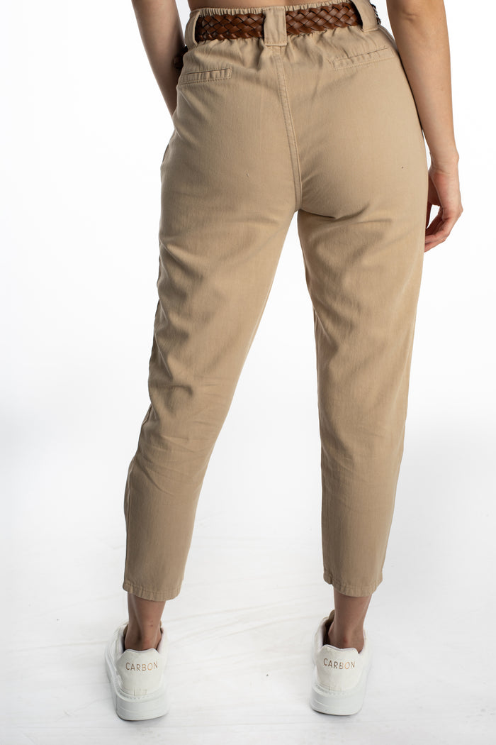 Back view of Camryn high-waisted beige trousers featuring a brown braided belt and tapered leg with a trendy fit.