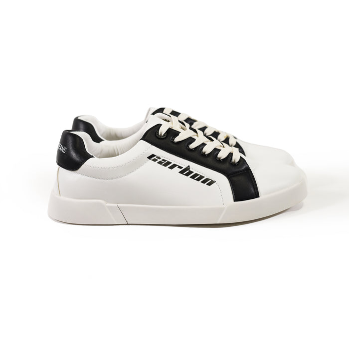 Carbon urban streetwear sneakers in white and black leather with side logo and low-top profile on white background.