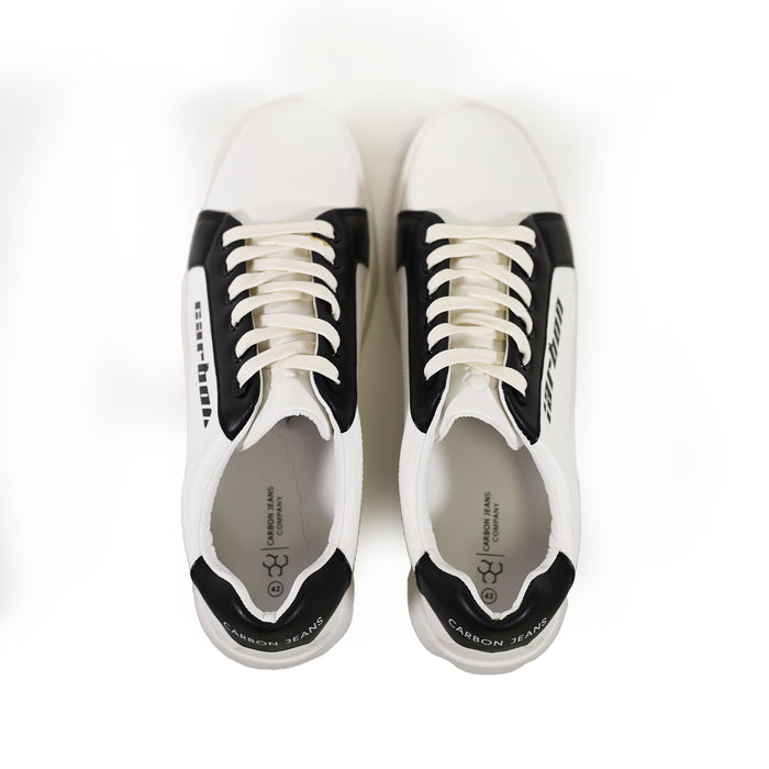 Top-down view of Carbon black and white urban streetwear sneakers with leather panels and branded insoles.