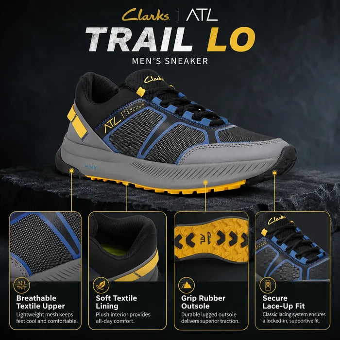 Black trail low sneaker with blue mesh panels and gray midsole with yellow trim