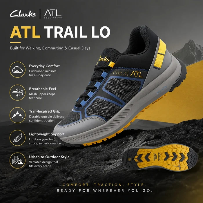 Black trail low sneaker with blue upper and yellow grip outsole