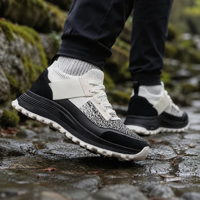 Women’s lace-up knit sneaker, white and black upper with a rugged treaded outsole