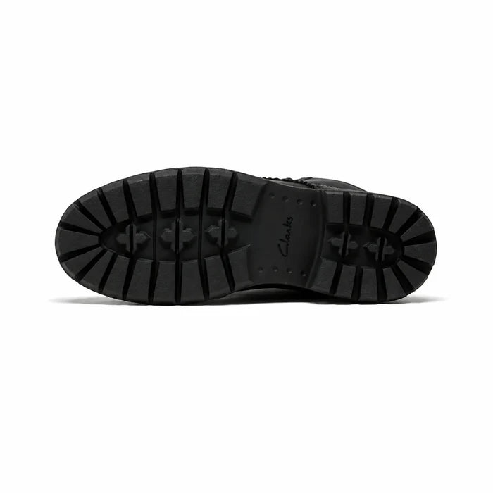 Black rubber outsole for lace-up brogue boots with deep tread pattern