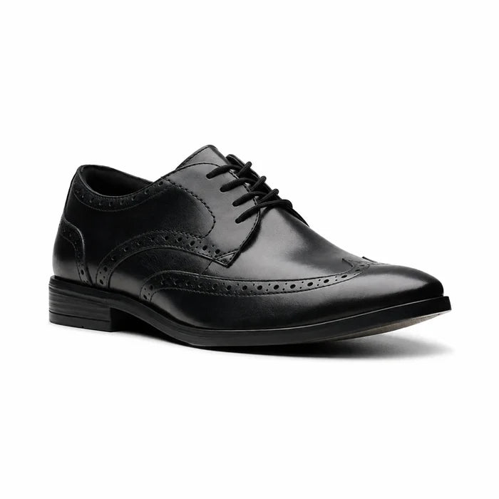 Men's black leather brogue dress shoes with lace-up front and wingtip details