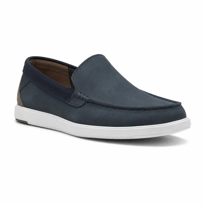 Men's navy nubuck slip-on loafers with moc-style stitching and white rubber sole