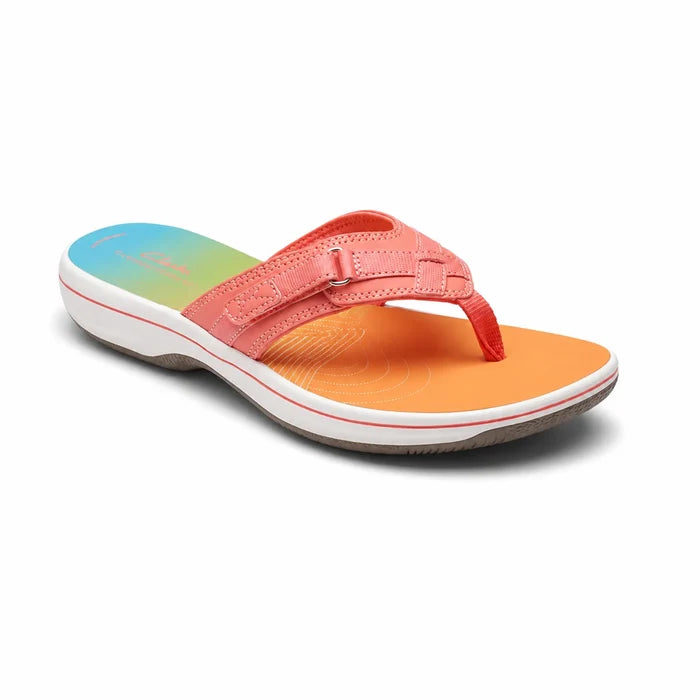 Pink thong slide sandal with adjustable strap, multicolor footbed, and cushioned sole