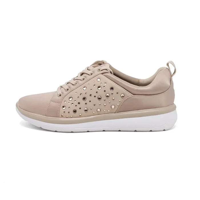 Taupe metallic lace-up sneaker with studded panel design and cushioned white sole.