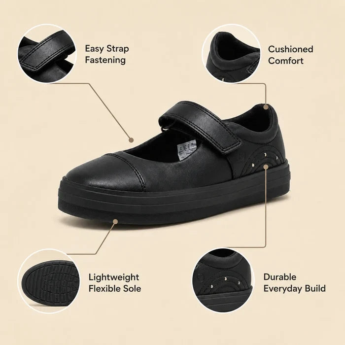 Black kids loafer with easy strap closure and lightweight, flexible sole.