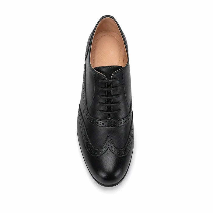 Black lace-up brogue dress shoes with classic perforation detail and rubber sole