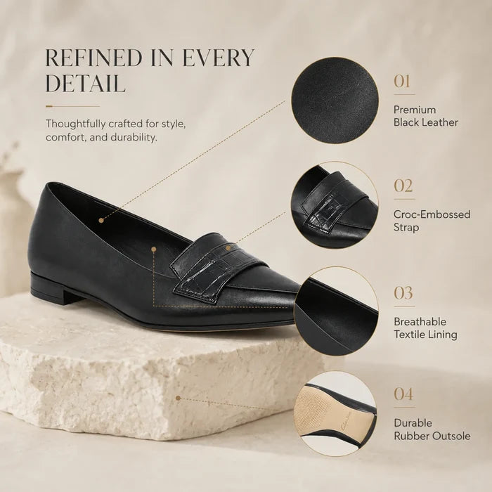 Black leather women's loafer with croc-embossed strap and low block heel