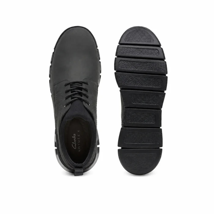 Bottom view of men's black lace-up business shoes with treaded outsole