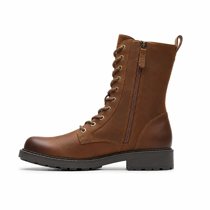 Brown leather lace-up ankle boots with side zip and thick rubber sole