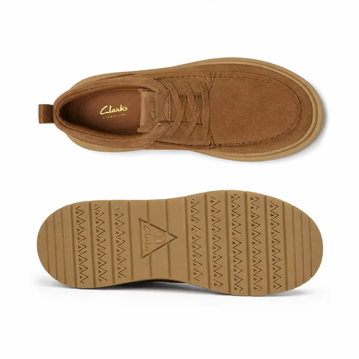 Dark brown suede moc toe loafer with stitched upper and textured grip outsole