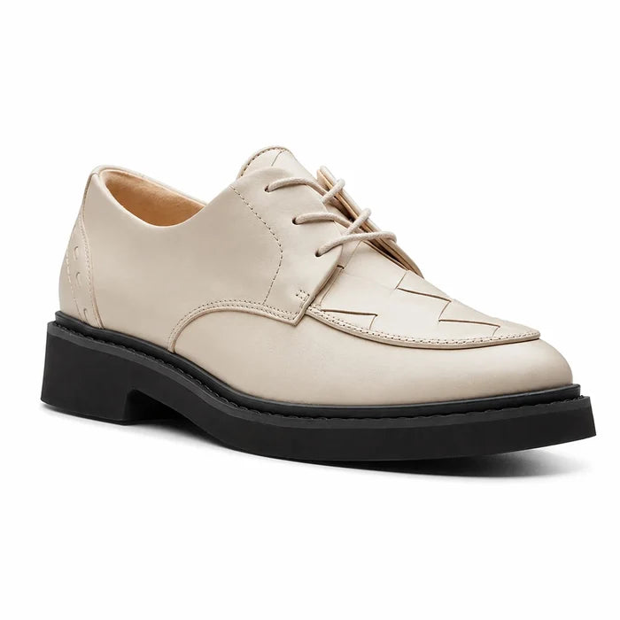 Women’s white leather lace-up business shoes with low chunky black rubber sole