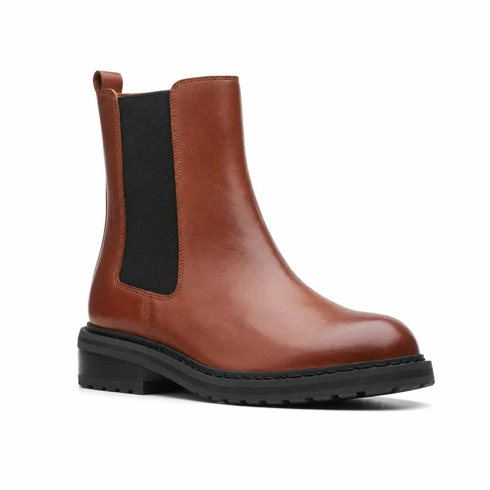 Brown women's Chelsea boot with side elastic panels and chunky black tread sole