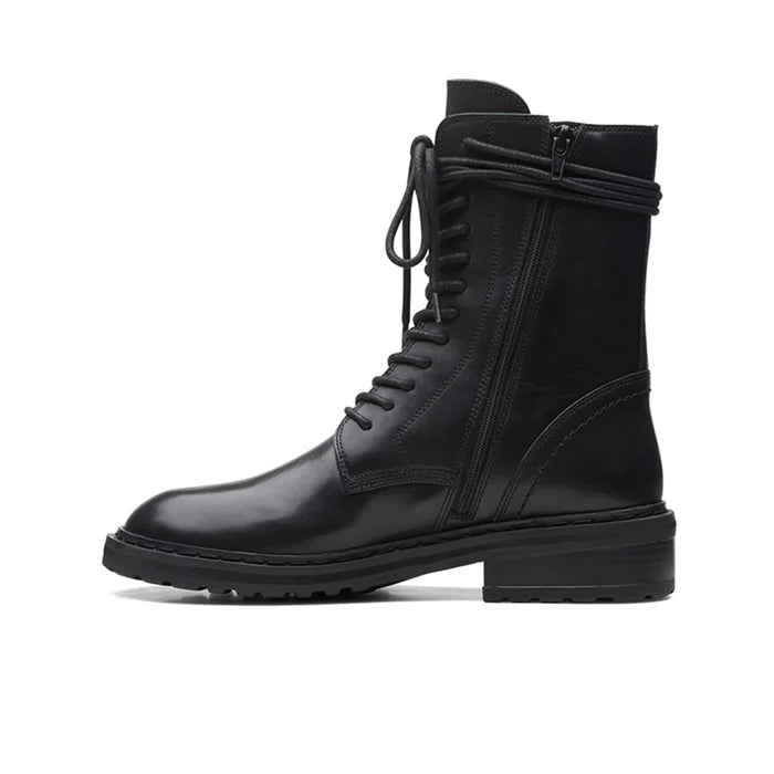 Black leather lace-up ankle boots with side panel stitching and low block heel sole.