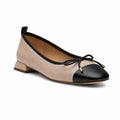 Women’s leather loafers, beige with black cap toe and bow laces, low block heel
