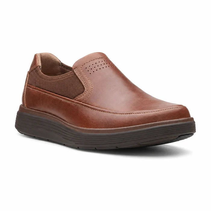 Brown leather slip-on business shoe with perforated toe panel and chunky rubber sole