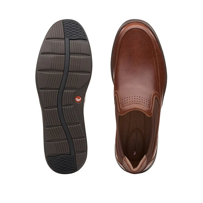 Brown leather slip-on shoe: rubber outsole tread and stitched toe view