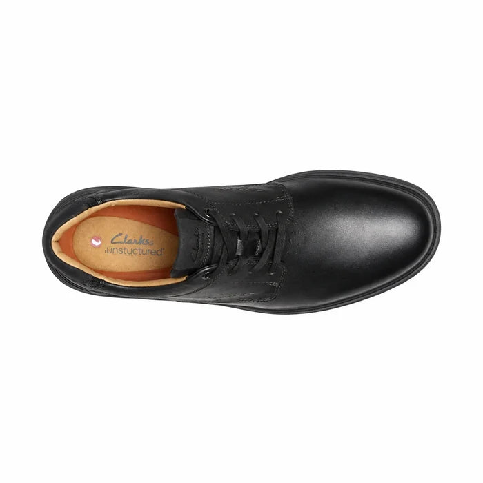 Men's black leather lace-up business shoe with tan insole, side view