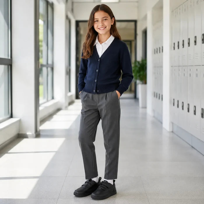 Black kids sneakers with white socks worn by a child