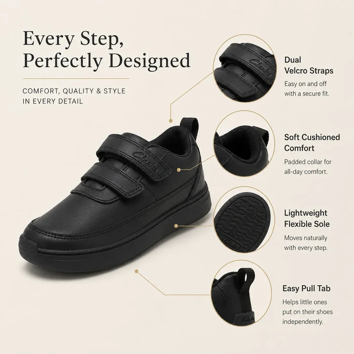 Black kids sneakers with dual Velcro straps, cushioned collar, flexible tread sole