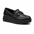 Black leather platform loafer with front strap and cushioned collar
