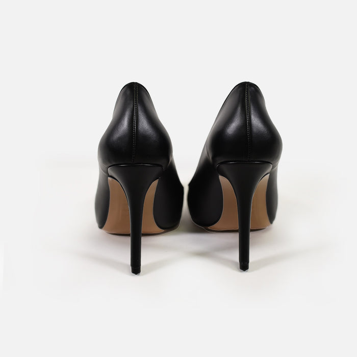 Rear view of sleek black stiletto pumps with pointed toes and slim 4-inch heels in smooth leather for a classic look.