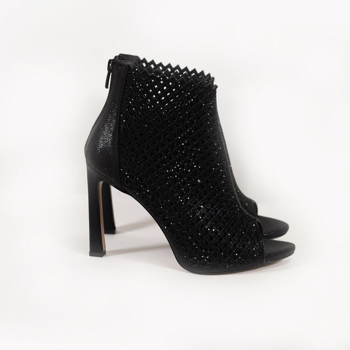 Black rhinestone stiletto heels featuring a perforated mesh cutout design, peep toe, and back zipper for evening wear.