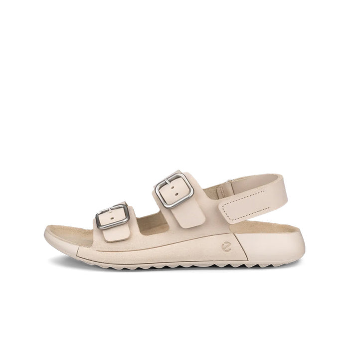 Beige three-strap outdoor sandals with metal buckle closures and cushioned sole