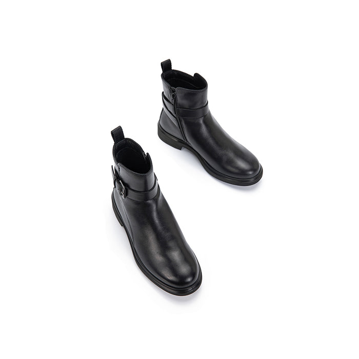 Pair of black leather ankle boots with side buckle strap and pull tab