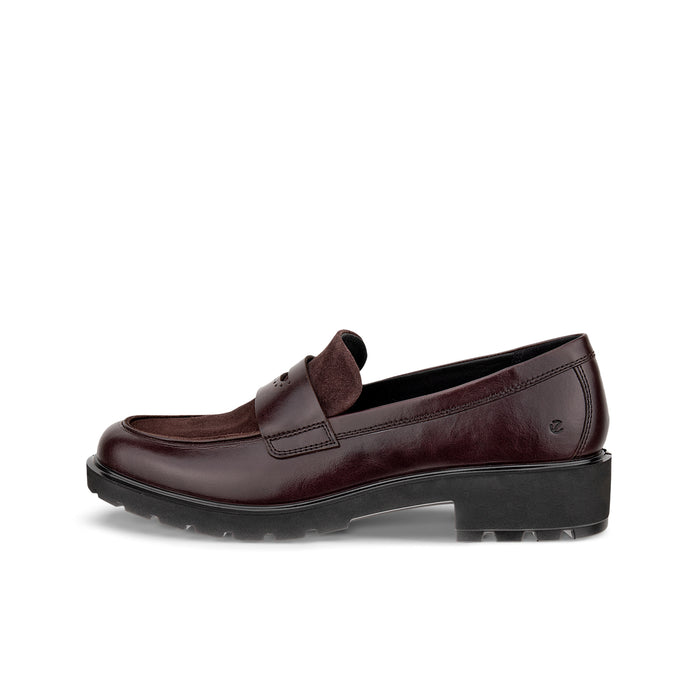 Brown leather slip-on loafer with strap detail and chunky tread sole