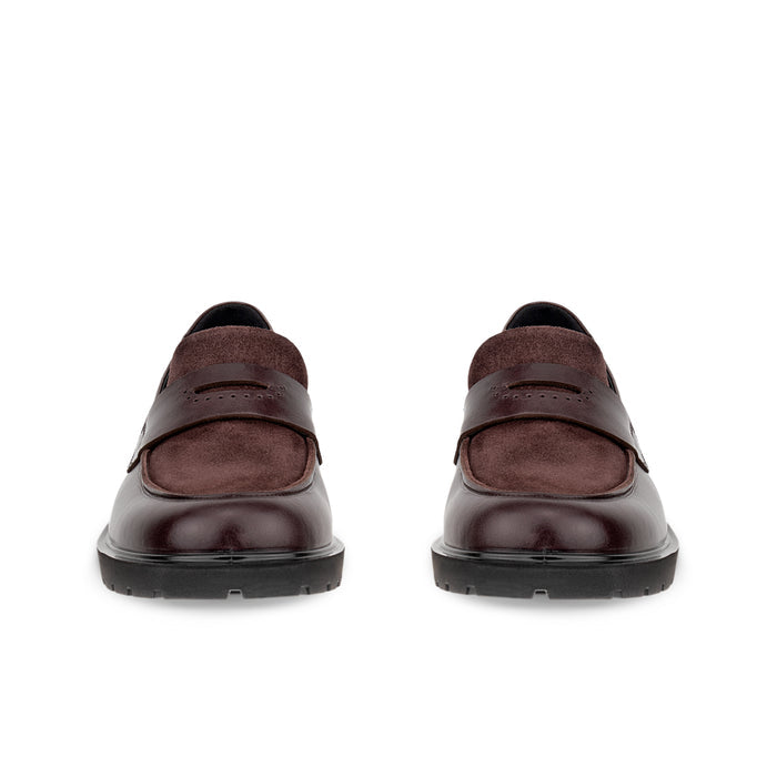 Brown leather slip-on loafers, rear view, with cushioned heel and tread sole