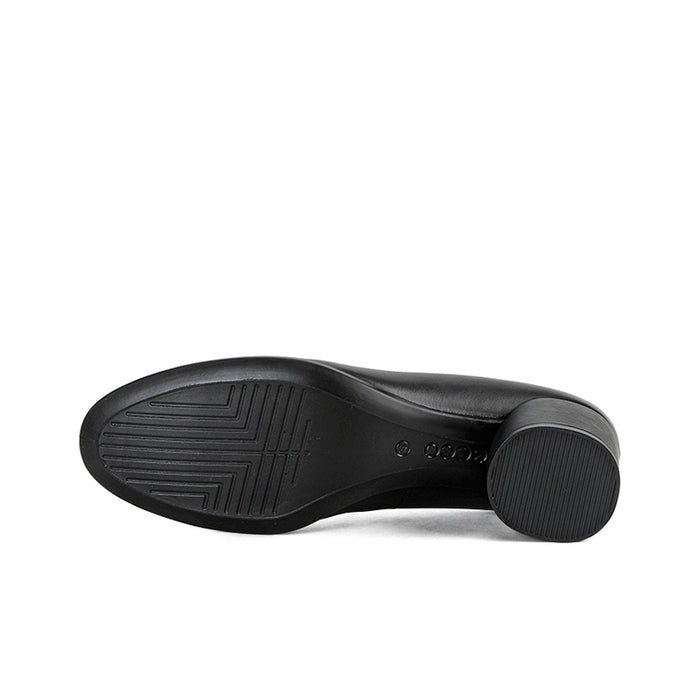 Black leather loafers with textured outsole tread and low block heel