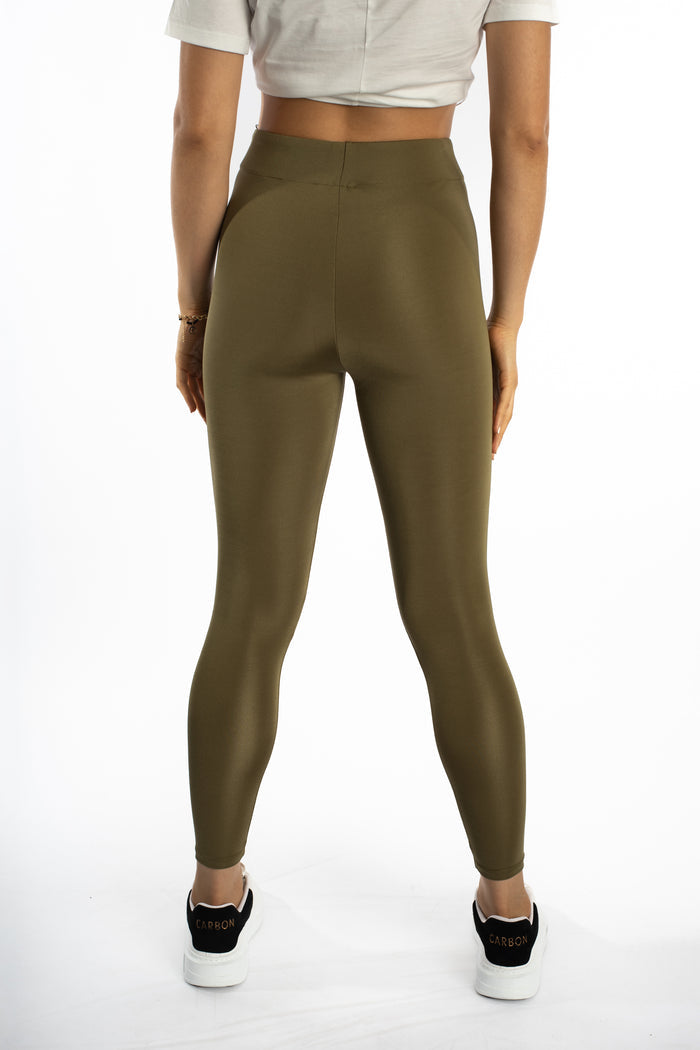 Rear view of Emory high-waisted olive green leggings by Carbon, featuring a sculpting squat-proof athletic compression fit.