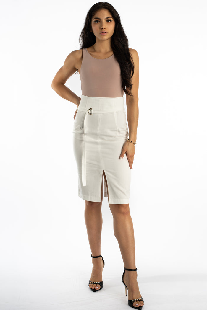 Model wears the Carbon Evie Sleeveless Bodysuit with a high-waisted belted white skirt and black strappy heels.