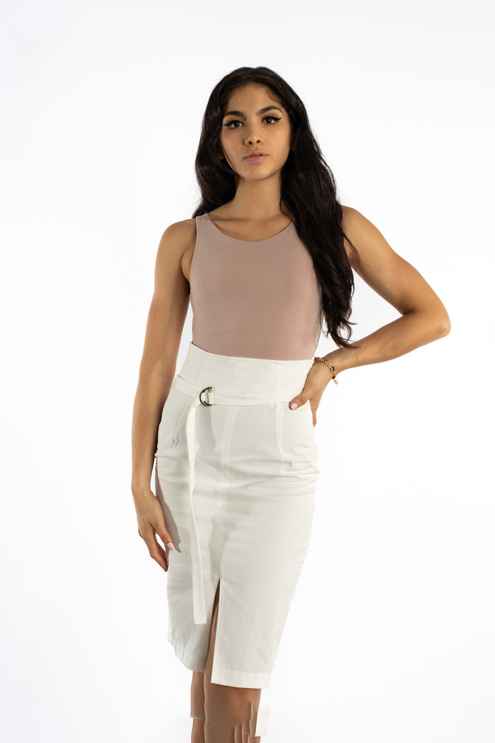 Model in Evie sleeveless bronze bodysuit and belted white midi skirt. Sleek, curve-hugging OOTD streetwear style.