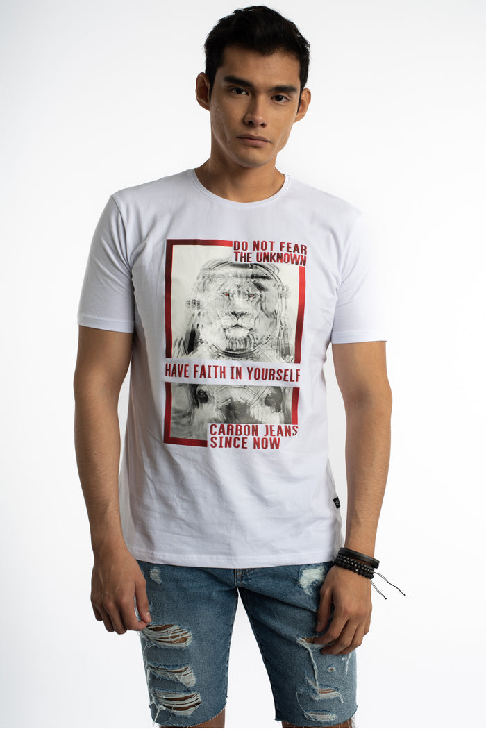 Model in a white Faith In Yourself streetwear tee with lion astronaut graphic and red text, paired with distressed jeans.