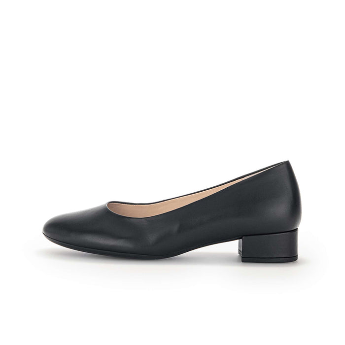 Black leather court pump with low block heel and curved topline