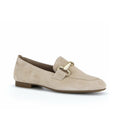 Beige suede-look loafer slip-on with metal buckle detail and low stacked heel