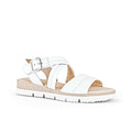 White leather sandal with two straps and square buckle on a cushioned sole