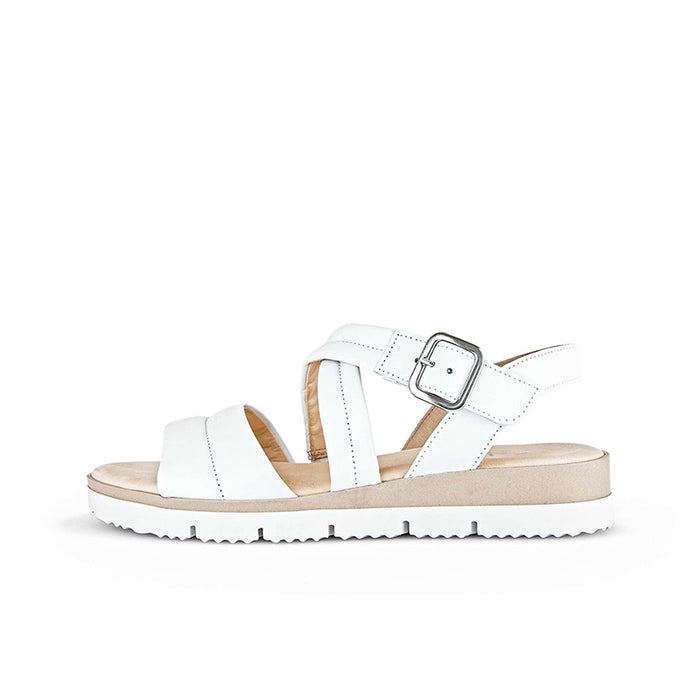 White leather slide sandal with crisscross straps and square buckle