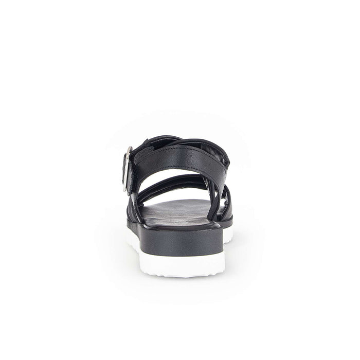 Black leather sandal with ankle strap and adjustable buckle on cushioned footbed