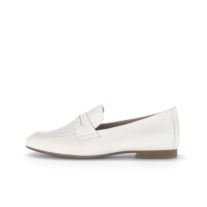 Beige leather slip-on loafer with strap across the vamp and low stacked heel