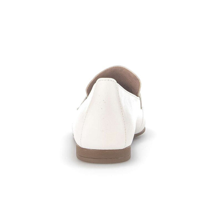 Beige leather loafer back view with cushioned collar and low heel